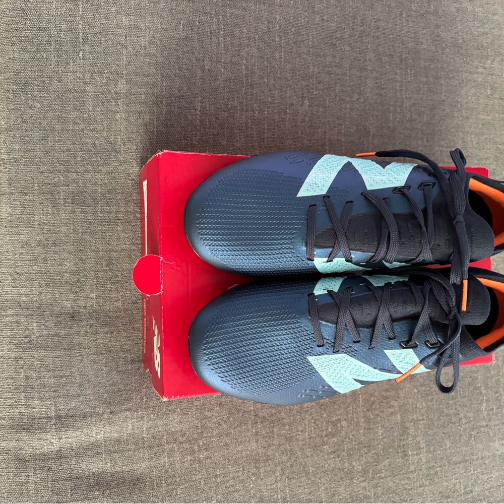 New Balance Tekela V4+ Soccer Cleats